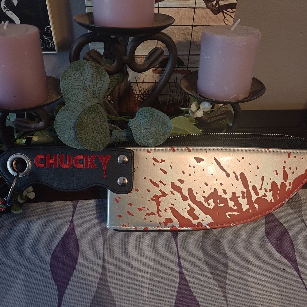 Silver and Red Decorative Knife
